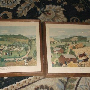 vintaged framed in glass. grandma Moses prints. set of 2